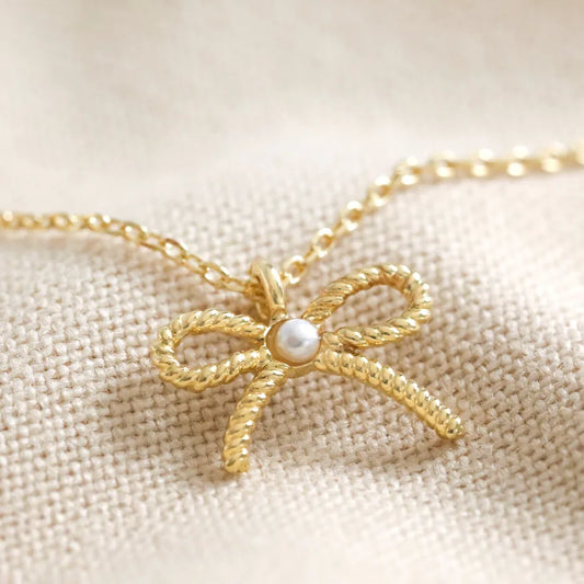 Lisa Angel Tiny Pearl Bow Pendant Necklace in Gold